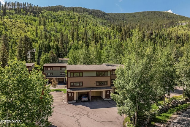 2540 Kinnikinnick Rd Unit G-2, Vail, CO 81657 - mountain view featuring a heavily wooded area