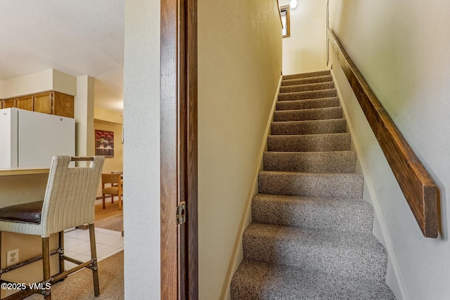 2540 Kinnikinnick Rd Unit G-2, Vail, CO 81657 - stairs featuring carpet floors