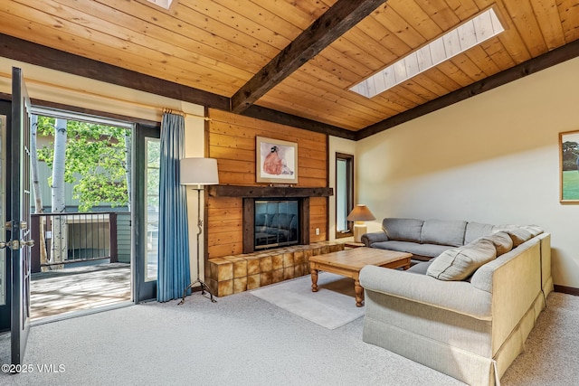 2540 Kinnikinnick Rd Unit G-2, Vail, CO 81657 - carpeted living area with a skylight, a wood ceiling with exposed beams, and a glass covered fireplace
