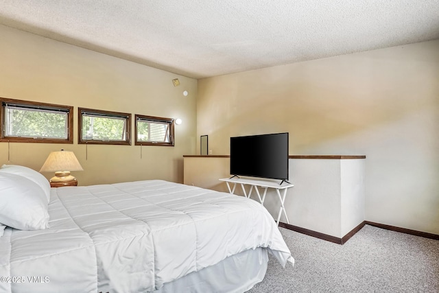 2540 Kinnikinnick Rd Unit G-2, Vail, CO 81657 - carpeted bedroom with a textured ceiling and baseboards