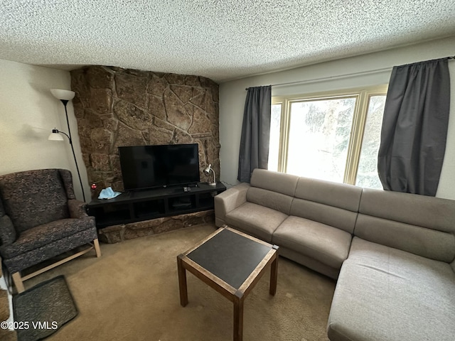 living room featuring carpet and a textured ceiling