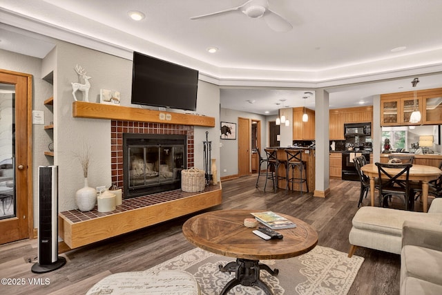 120 Offerson Unit 5160, Beaver Creek, CO 81620 - living area with ceiling fan, a brick fireplace, wood finished floors, and recessed lighting