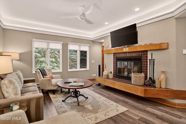 120 Offerson Unit 5160, Beaver Creek, CO 81620 - living room with wood finished floors, a fireplace, a ceiling fan, a baseboard radiator, and recessed lighting