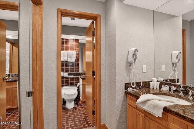 120 Offerson Unit 5160, Beaver Creek, CO 81620 - bathroom with a textured wall, vanity, and tile patterned floors
