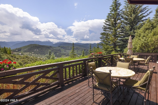 wooden terrace with a mountain view