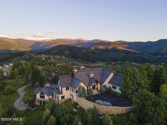 aerial view at dusk with a mountain view