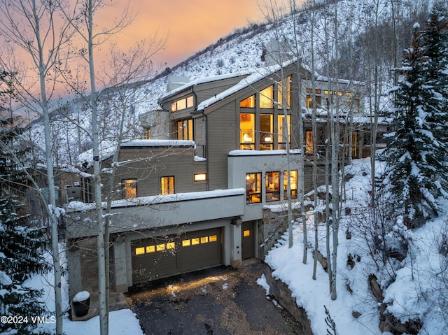 view of front of property with a garage