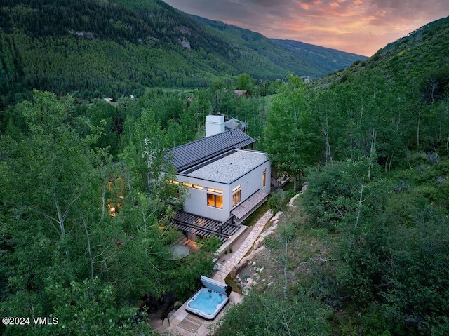 aerial view at dusk with a mountain view