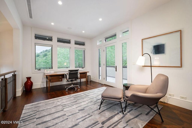 living area featuring dark hardwood / wood-style flooring