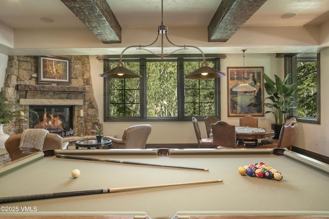 179 S Fairway Dr, Beaver Creek, CO 81620 - game room featuring billiards table, beamed ceiling, plenty of natural light, and a stone fireplace