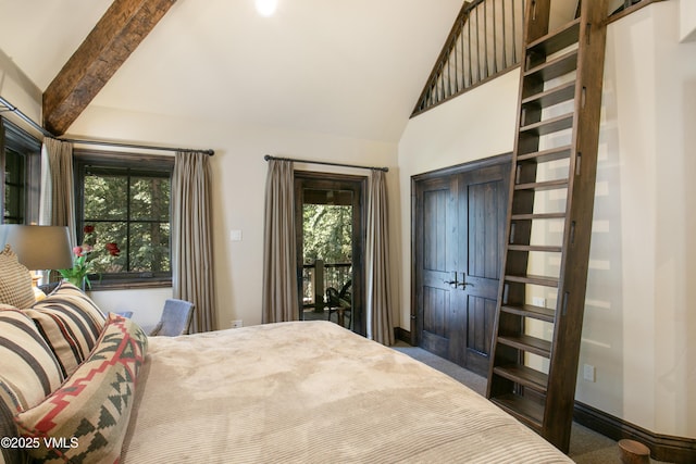 179 S Fairway Dr, Beaver Creek, CO 81620 - carpeted bedroom with multiple windows, lofted ceiling, and access to exterior