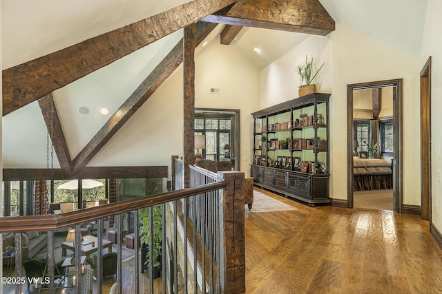 179 S Fairway Dr, Beaver Creek, CO 81620 - hall featuring high vaulted ceiling, beamed ceiling, wood finished floors, and an upstairs landing