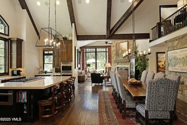 179 S Fairway Dr, Beaver Creek, CO 81620 - dining area with high vaulted ceiling, a chandelier, dark wood-type flooring, ceiling fan, and beam ceiling