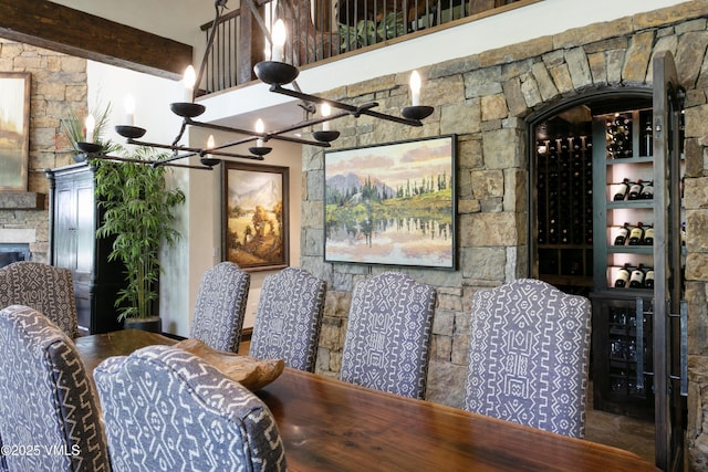 179 S Fairway Dr, Beaver Creek, CO 81620 - dining area featuring a chandelier and beamed ceiling