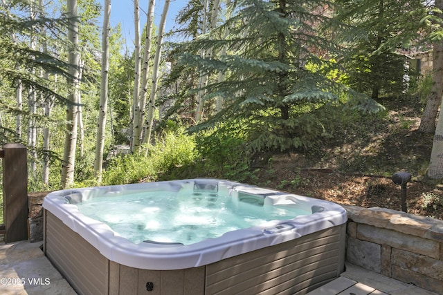 179 S Fairway Dr, Beaver Creek, CO 81620 - view of patio featuring a hot tub