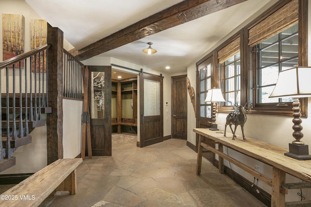 179 S Fairway Dr, Beaver Creek, CO 81620 - foyer entrance featuring beam ceiling, stone tile floors, a barn door, recessed lighting, and stairs