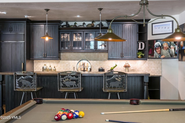 179 S Fairway Dr, Beaver Creek, CO 81620 - bar with billiards table, backsplash, and hanging light fixtures