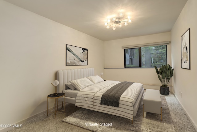 777 Potato Patch Dr Unit A, Vail, CO 81657 - carpeted bedroom with baseboards and a chandelier