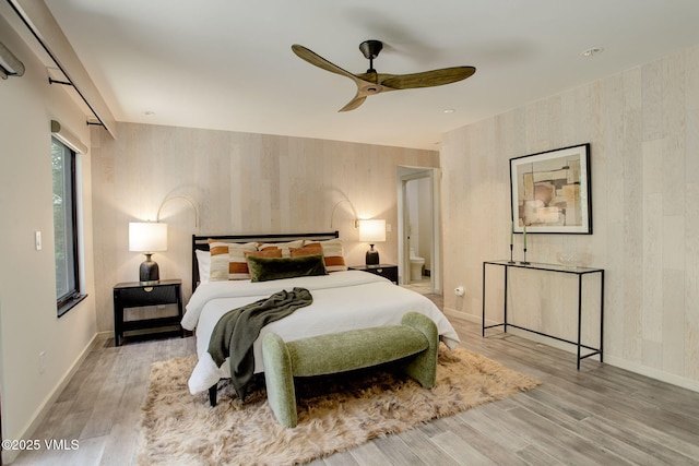 777 Potato Patch Dr Unit A, Vail, CO 81657 - bedroom with wood finished floors, wallpapered walls, and a ceiling fan