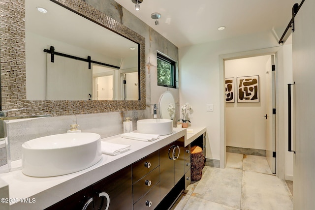 777 Potato Patch Dr Unit A, Vail, CO 81657 - full bathroom featuring double vanity and decorative backsplash