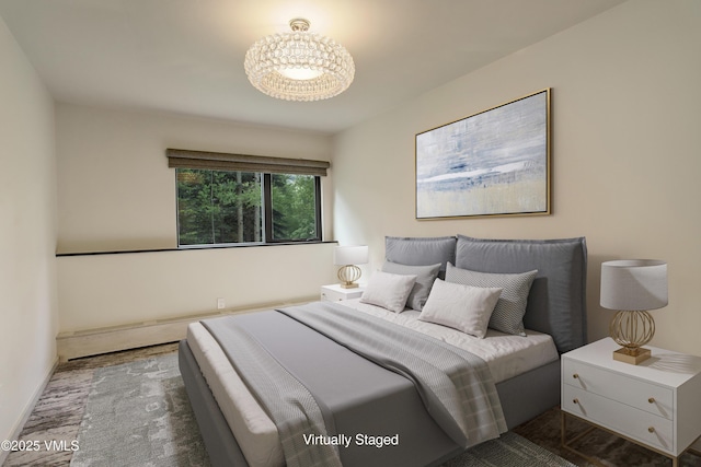 777 Potato Patch Dr Unit A, Vail, CO 81657 - bedroom with a chandelier and baseboards