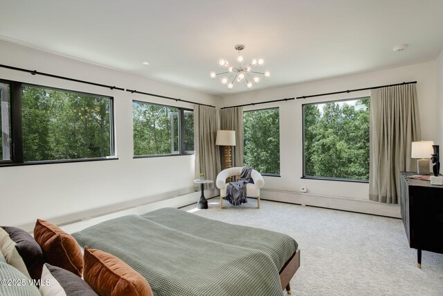 777 Potato Patch Dr Unit A, Vail, CO 81657 - carpeted bedroom with multiple windows and a chandelier