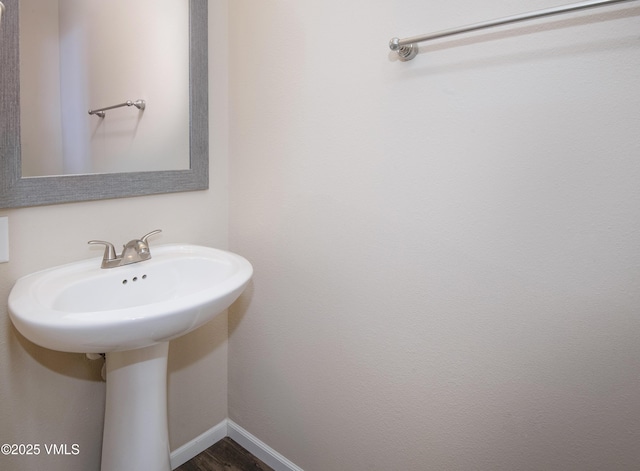 bathroom featuring baseboards