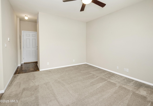 unfurnished room featuring carpet floors, a ceiling fan, and baseboards
