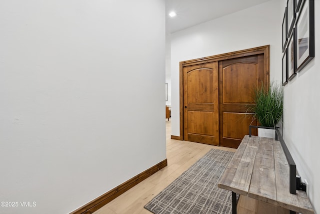 295 Main St Unit R305, Edwards, CO 81632 - hallway featuring light wood-type flooring, baseboards, and recessed lighting