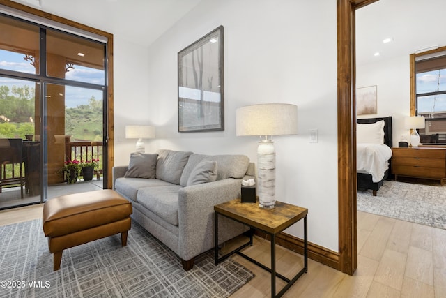 295 Main St Unit R305, Edwards, CO 81632 - living area with wood finished floors and recessed lighting