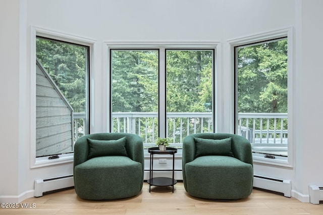1359 Greenhill Ct Unit E, Vail, CO 81657 - sitting room with a baseboard radiator and wood finished floors