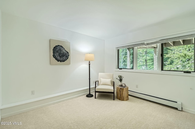 1359 Greenhill Ct Unit E, Vail, CO 81657 - living area featuring a baseboard heating unit and carpet
