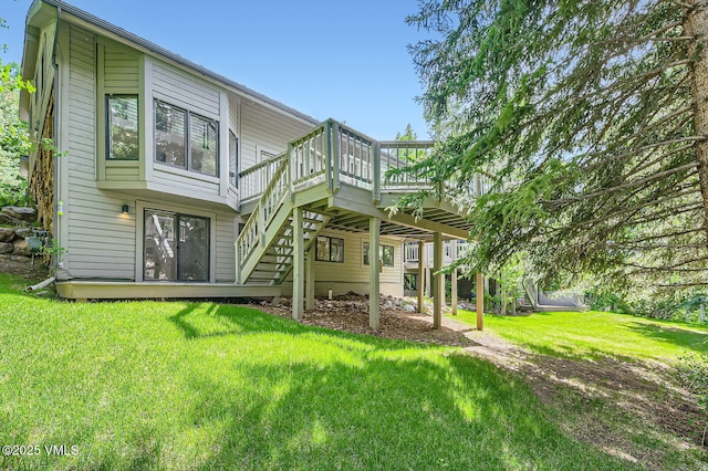 1359 Greenhill Ct Unit E, Vail, CO 81657 - rear view of property with stairs, a deck, and a lawn