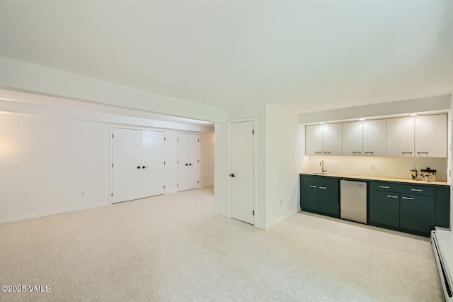 1359 Greenhill Ct Unit E, Vail, CO 81657 - kitchen with dishwasher, light carpet, light countertops, and a baseboard heating unit