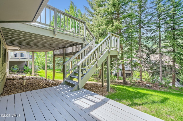 1359 Greenhill Ct Unit E, Vail, CO 81657 - wooden terrace featuring stairway and a yard