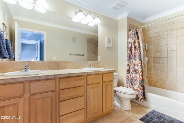 full bathroom with tile patterned floors, toilet, crown molding, and a sink