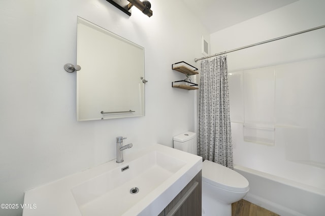 511 Metcalf Unit J30, Avon, CO 81620 - full bath featuring toilet, vanity, shower / bath combination with curtain, and wood finished floors