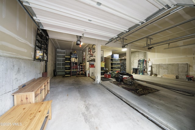 511 Metcalf Unit J30, Avon, CO 81620 - garage featuring a garage door opener