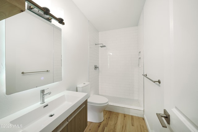 511 Metcalf Unit J30, Avon, CO 81620 - full bath with toilet, vanity, wood finished floors, and a shower stall