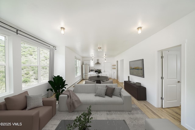 511 Metcalf Unit J30, Avon, CO 81620 - living area with light wood-style floors and baseboards
