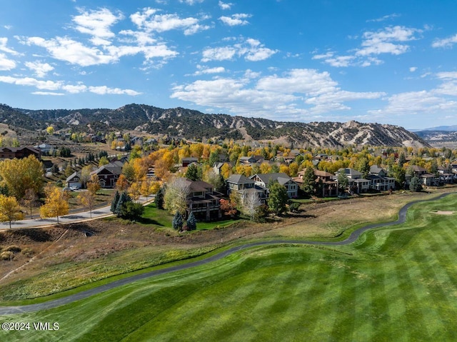 mountain view with a residential view and view of golf course