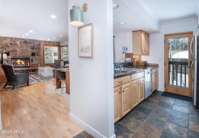4479 Timber Falls Ct Unit 2001, Vail, CO 81657 - kitchen featuring dishwasher, ornamental molding, a stone fireplace, open floor plan, and recessed lighting
