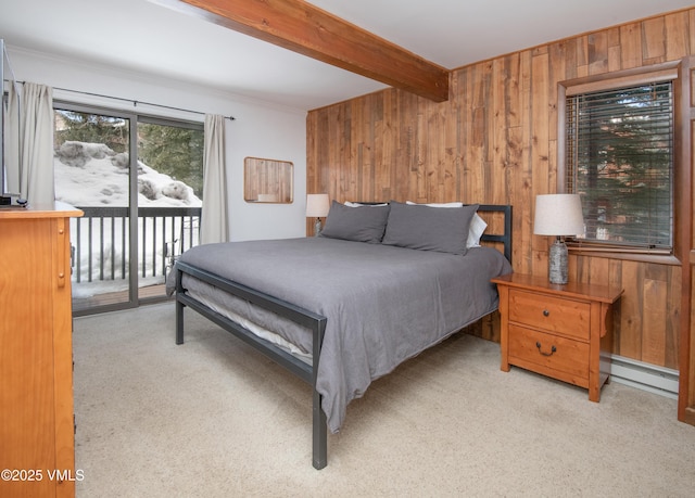 4479 Timber Falls Ct Unit 2001, Vail, CO 81657 - carpeted bedroom with wood walls, baseboard heating, access to exterior, and beam ceiling