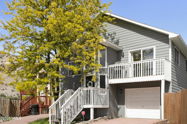 443 Porphyry Rd Unit F, Gypsum, CO 81637 - view of front of house featuring an attached garage, a balcony, and stairs