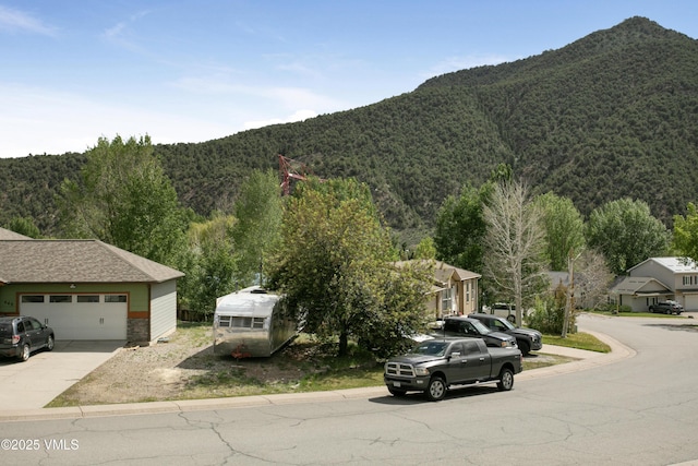 443 Porphyry Rd Unit F, Gypsum, CO 81637 - view of mountain backdrop with a heavily wooded area