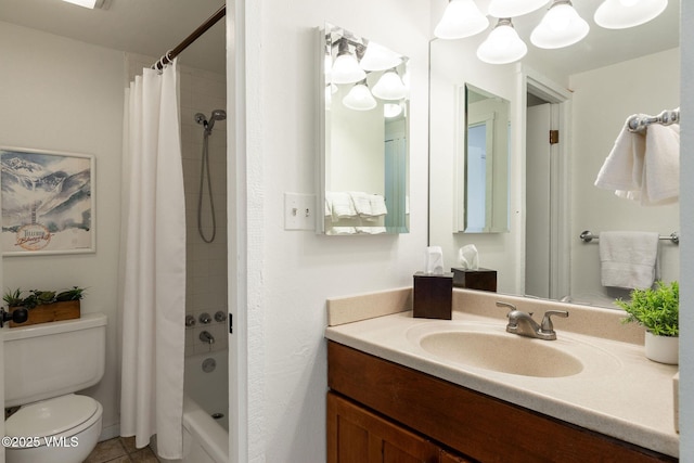 full bathroom with shower / tub combo with curtain, vanity, tile patterned flooring, and toilet