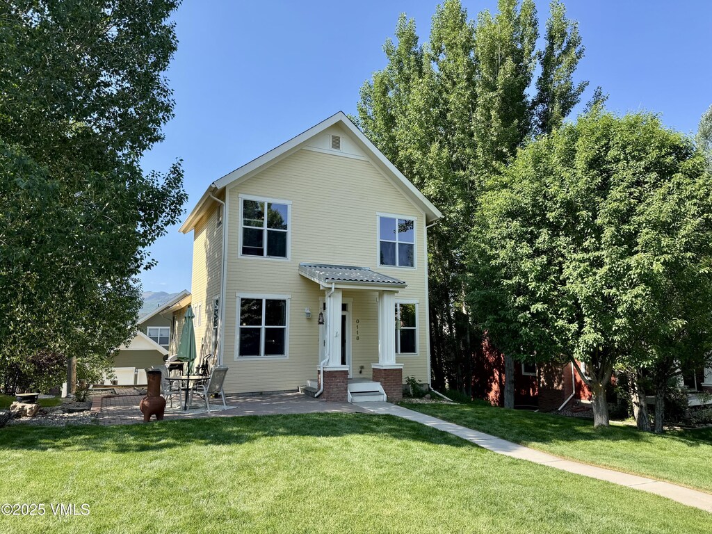 118 Tanager Cir, Eagle, CO 81631 - view of front of house featuring a front yard and a patio