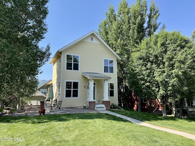 118 Tanager Cir, Eagle, CO 81631 - view of front of house featuring a front yard and a patio