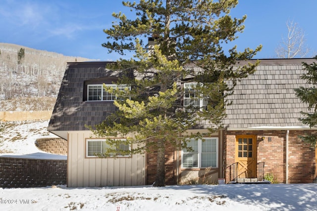 view of snow covered property