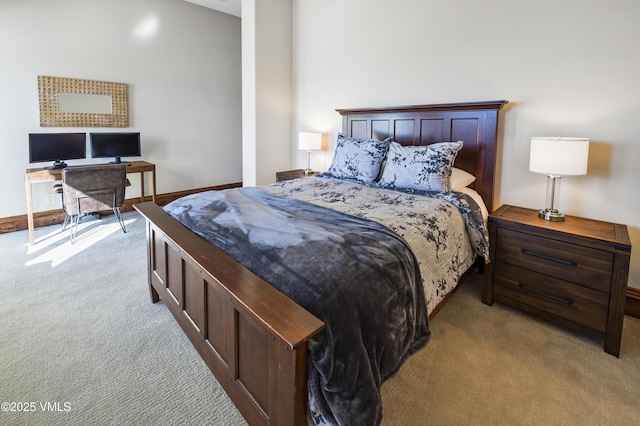 bedroom featuring light carpet